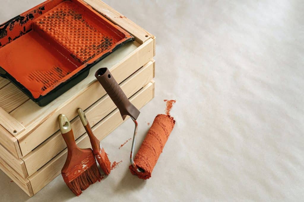 used paint roller and paint brush