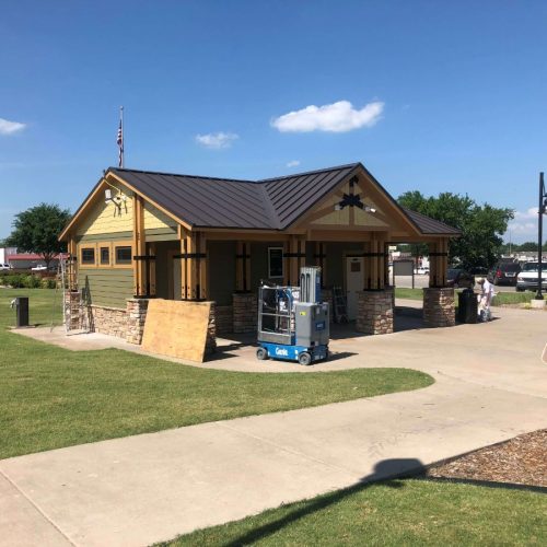 Exterior building painting and renovation in progress